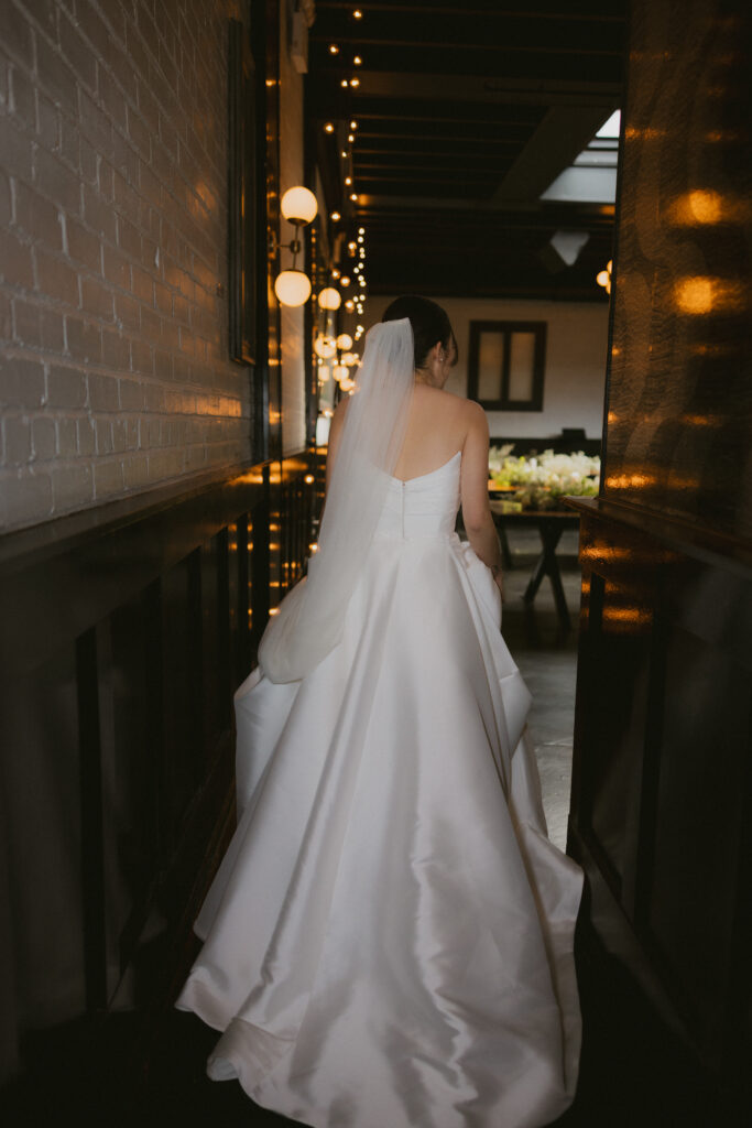 Bride walking to first look