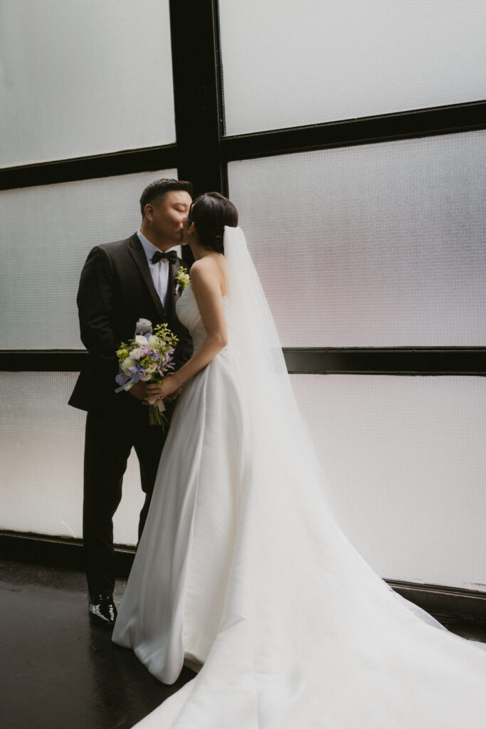 bride and groom kissing