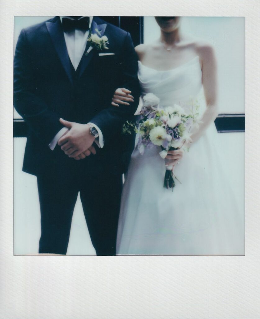 Polaroid of bride and groom outfits