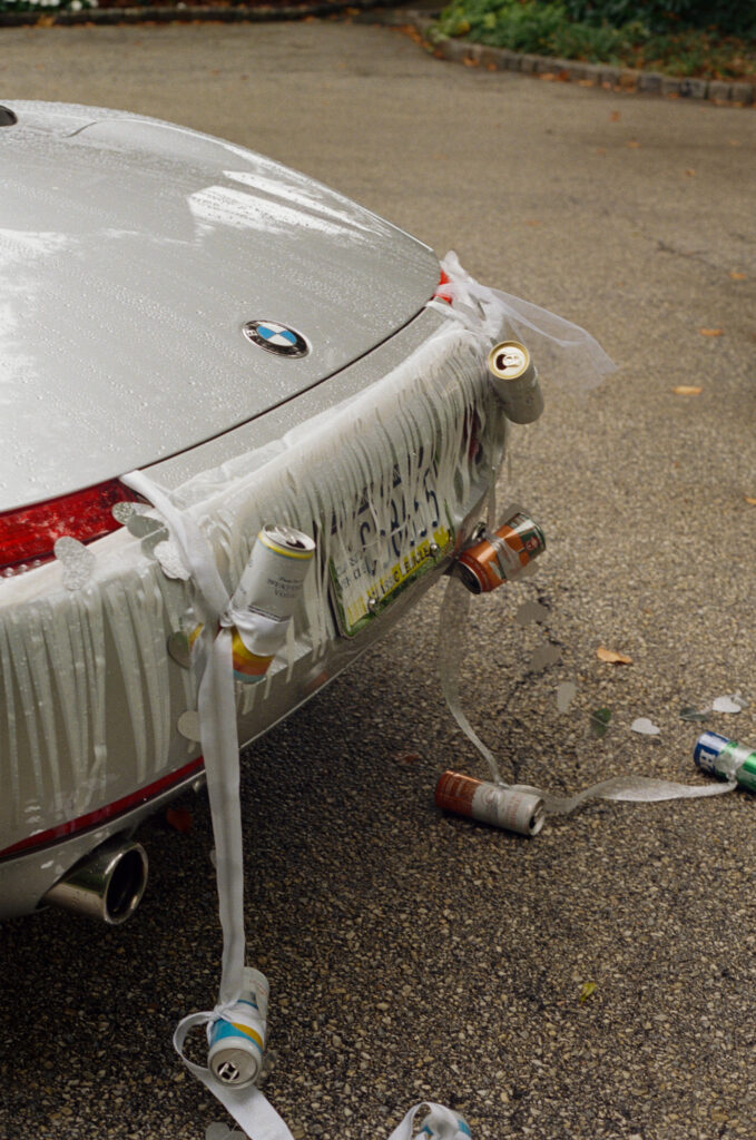 Close up detail of the wedding getaway car