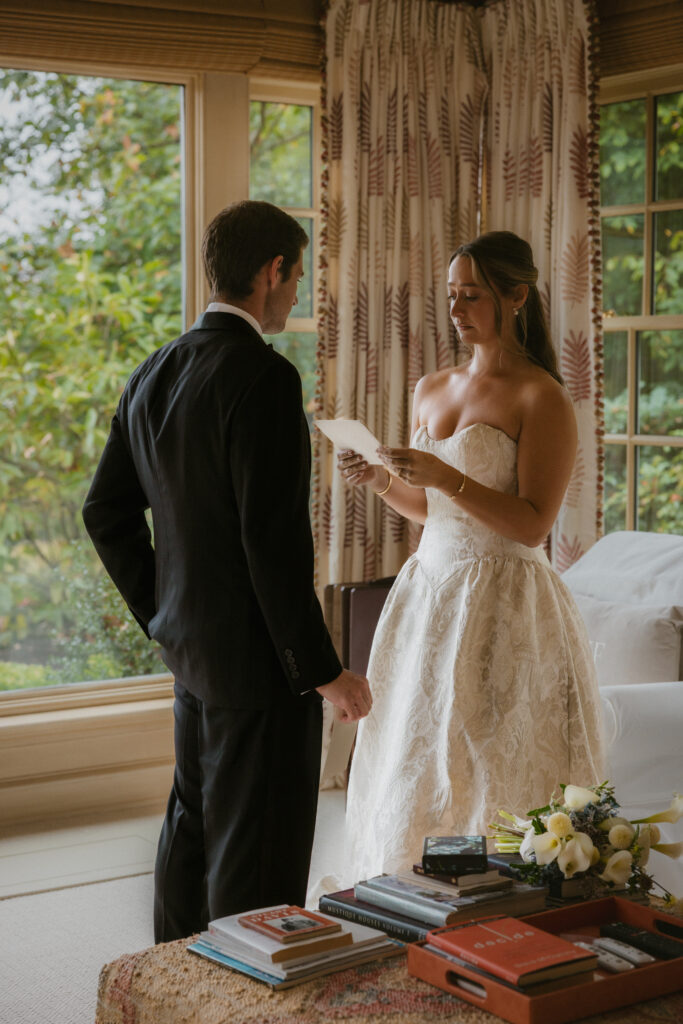 Bride reading her vows to the groom during their private vows 