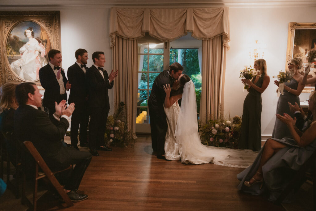 Bride and groom's first kiss during the ceremony
