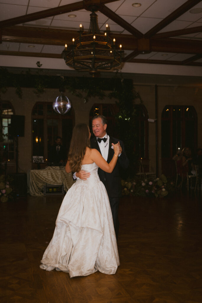 Father and daughter dance at wedding reception