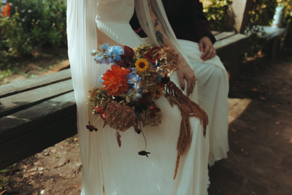 Close up of bridal bouquet on bride's lap