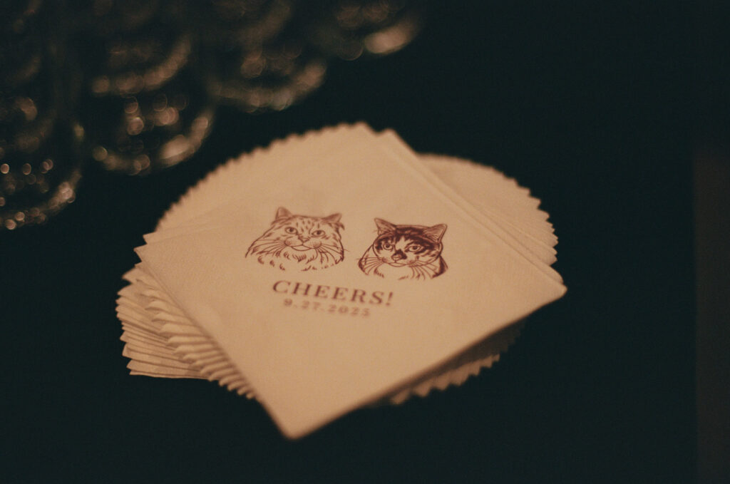 Custom branded wedding napkins with the couple's pet's faces on them