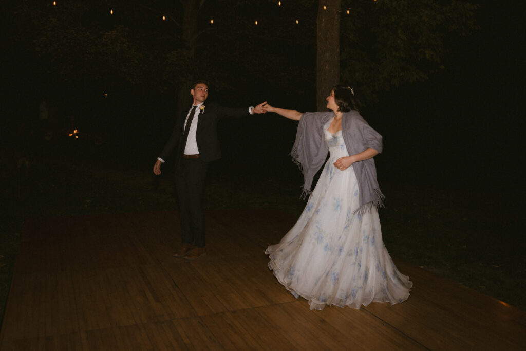 Bride and groom dancing together during the wedding reception