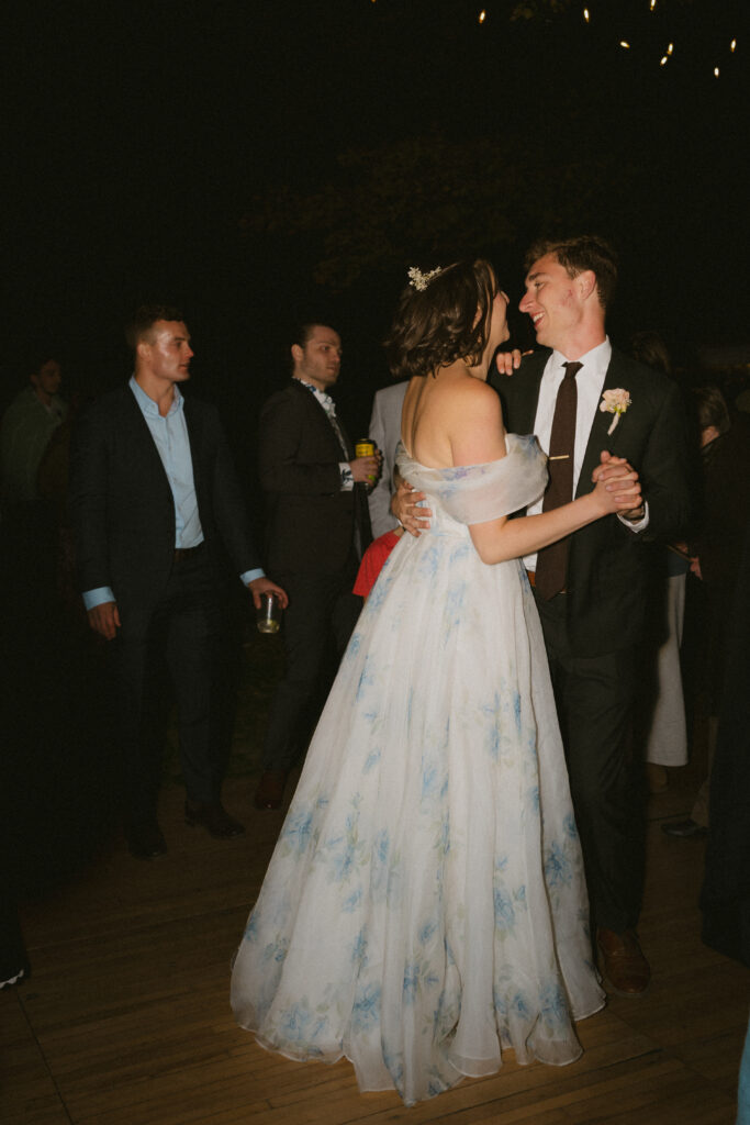 Bride and groom dancing together during the wedding reception