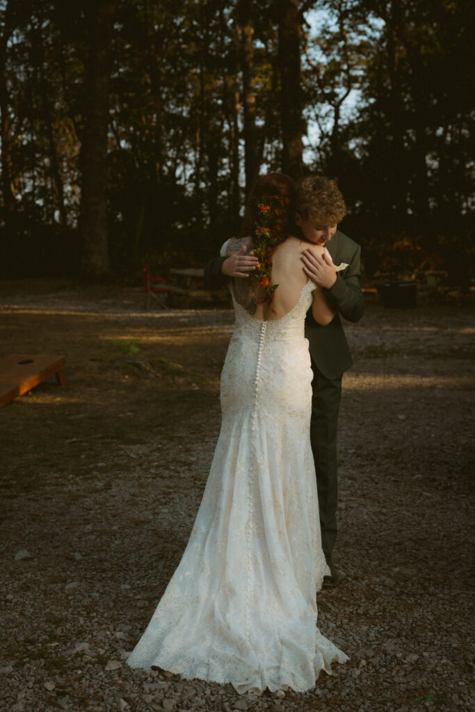Bride hugging her son