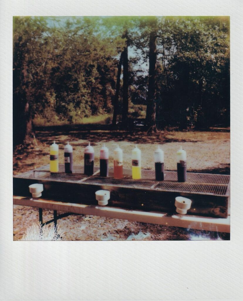 Polaroid of a tie dye station 