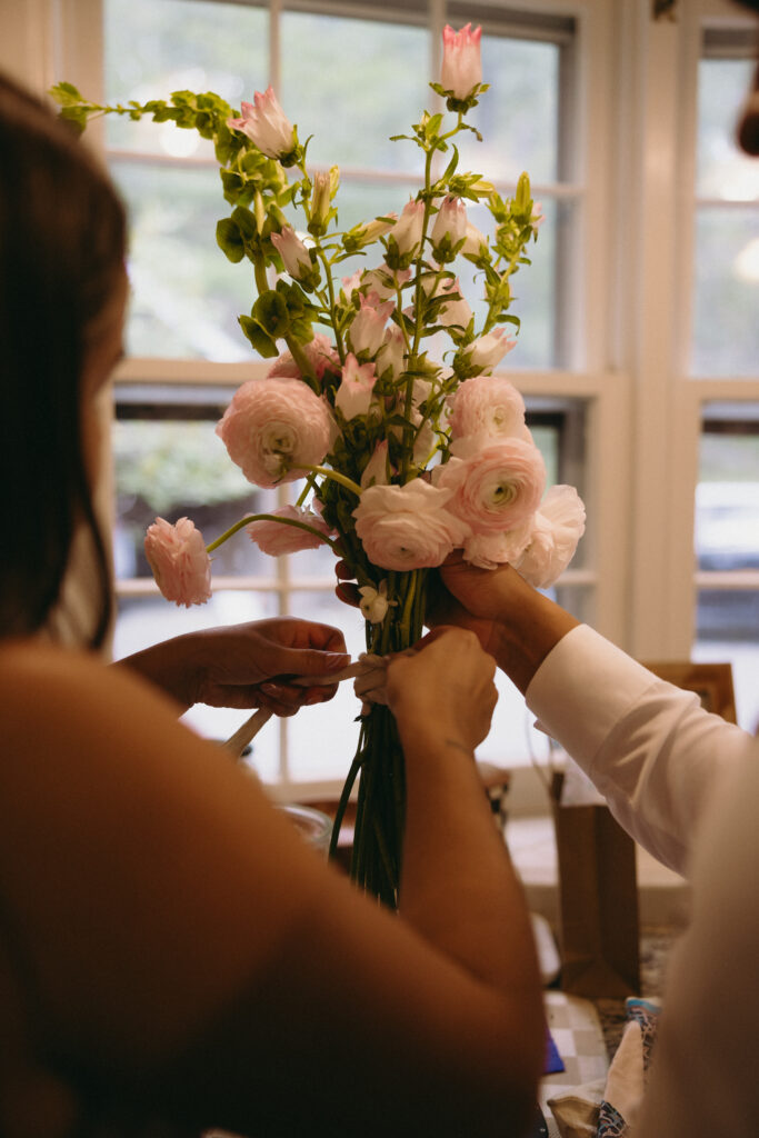 Bridal bouquet being put together at home