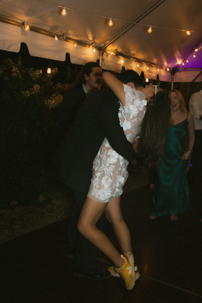 Bride and groom dancing together on the dance floor
