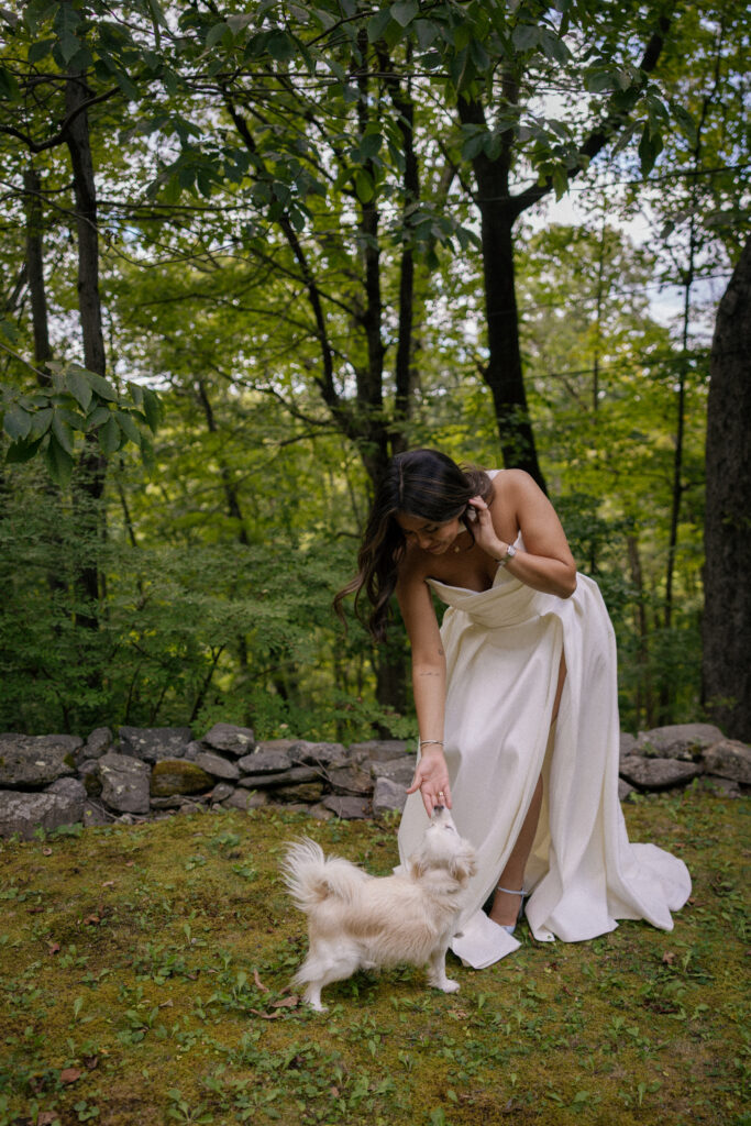 Bride playing with her dog