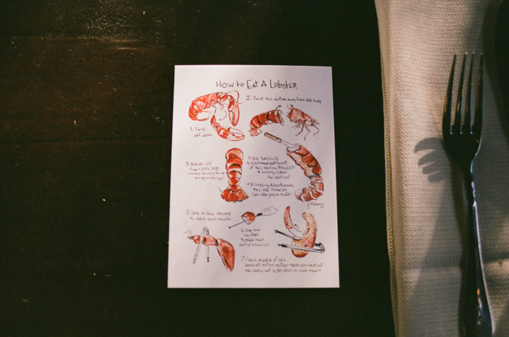 How to eat a lobster instruction manual at a wedding clambake dinner