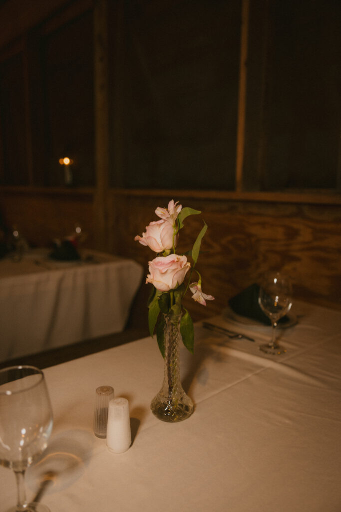 Reception tablescape details at summer camp wedding