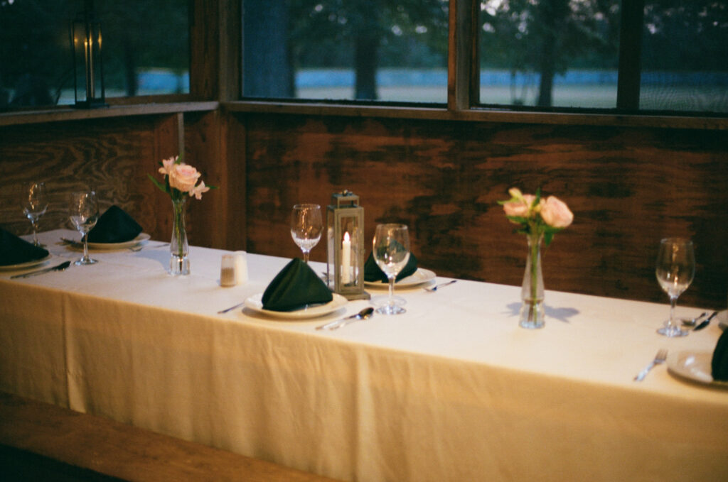 Reception tablescape at a summer camp wedding