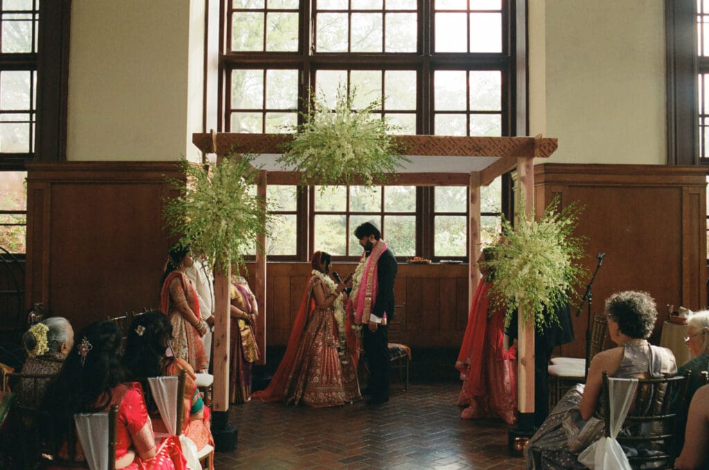 Bride and groom reading their chosen poems during the wedding ceremony