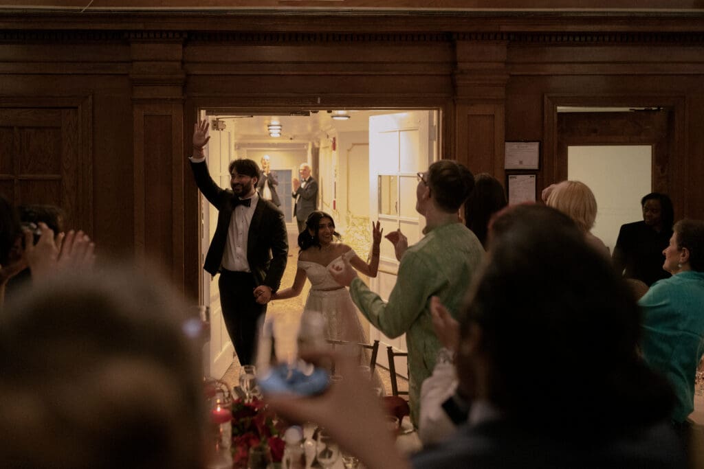 Newlywed entrance to their reception