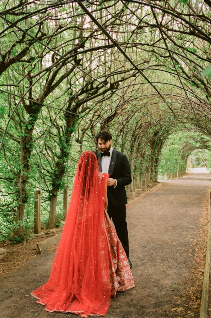 Bride and groom read their private vows at a Hindu Jewish wedding