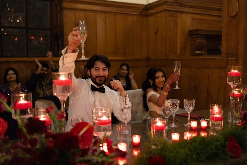 Bride and groom toasting during their reception