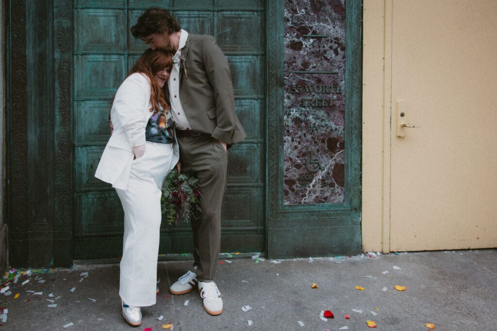 Couple outside manhattan city hall after eloping