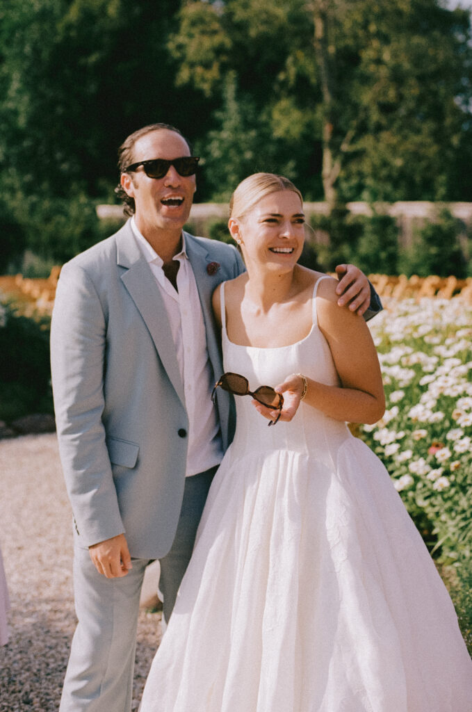Bride with a wedding guest during cocktail hour