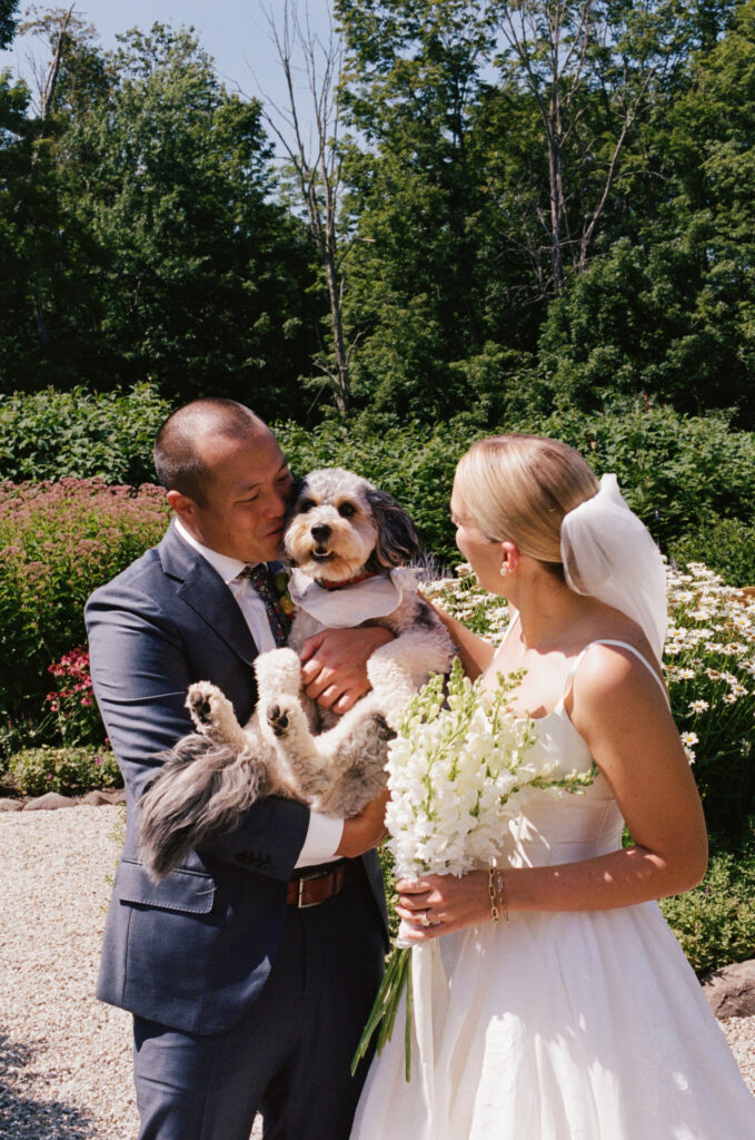 Bride and groom with their dog
