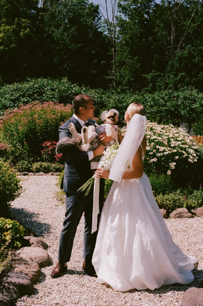 Bride and groom with their dog