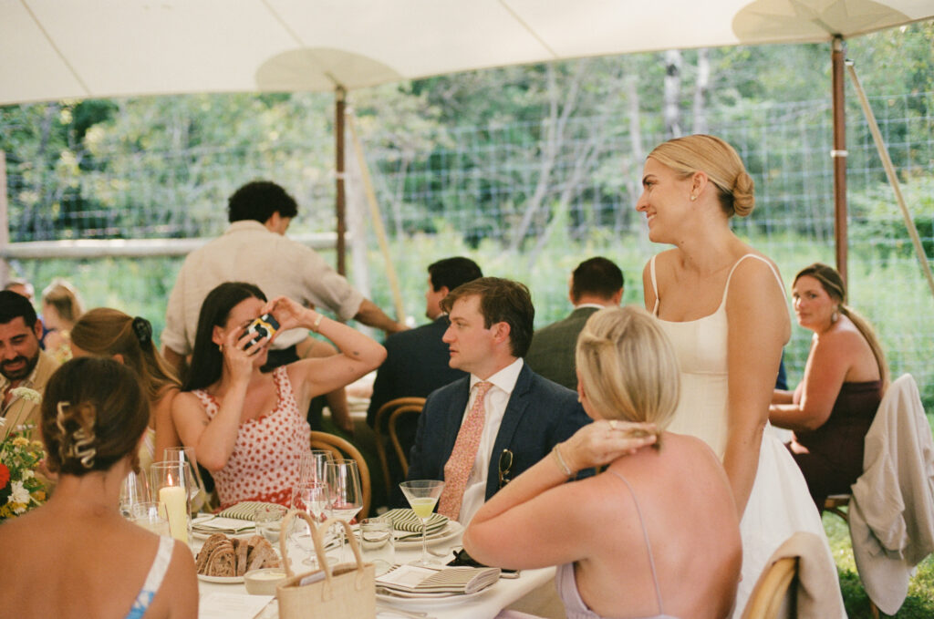 Bride interacting with wedding guests during the reception