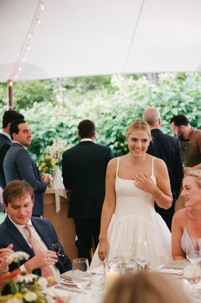 Bride interacting with wedding guests during the reception