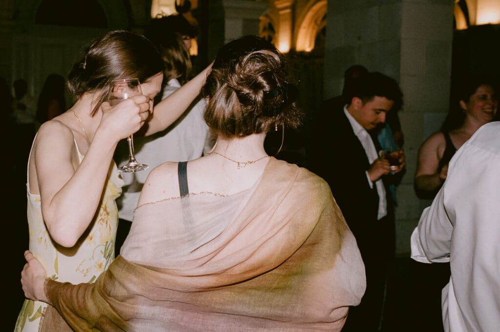 Wedding guests dancing at a prospect park boathouse wedding
