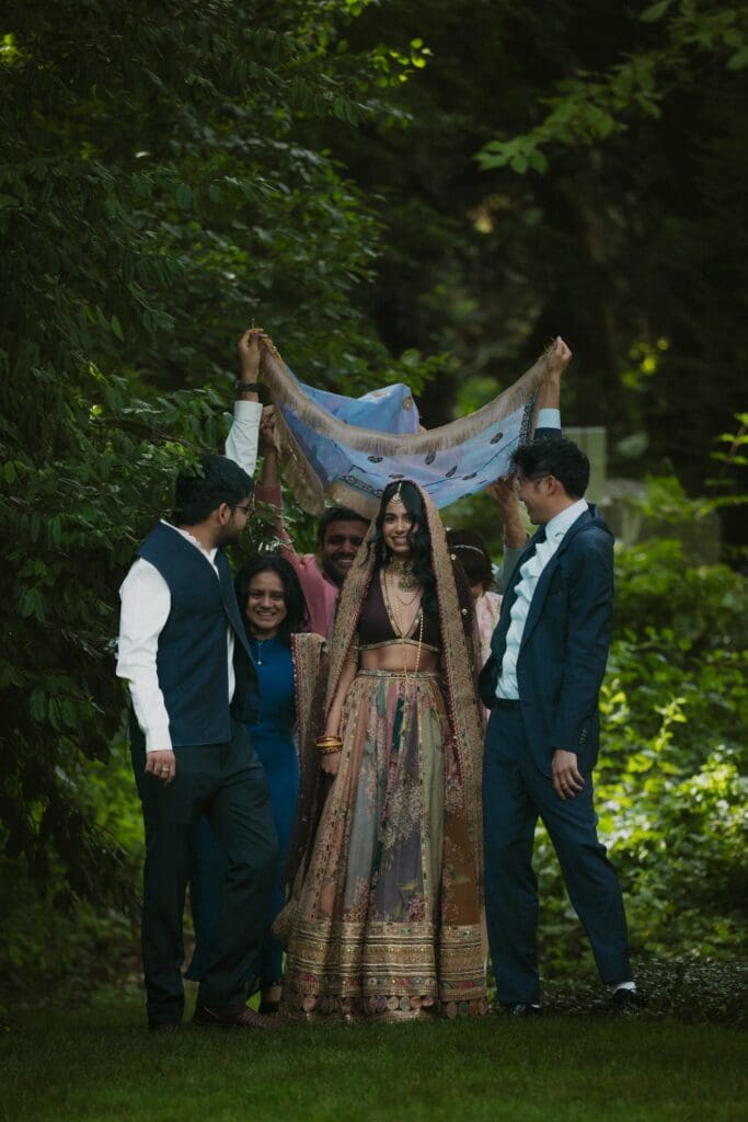Bride walking down the aisle at a whimsical backyard wedding