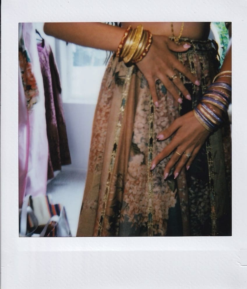 Close up of bride's lehenga and bangles