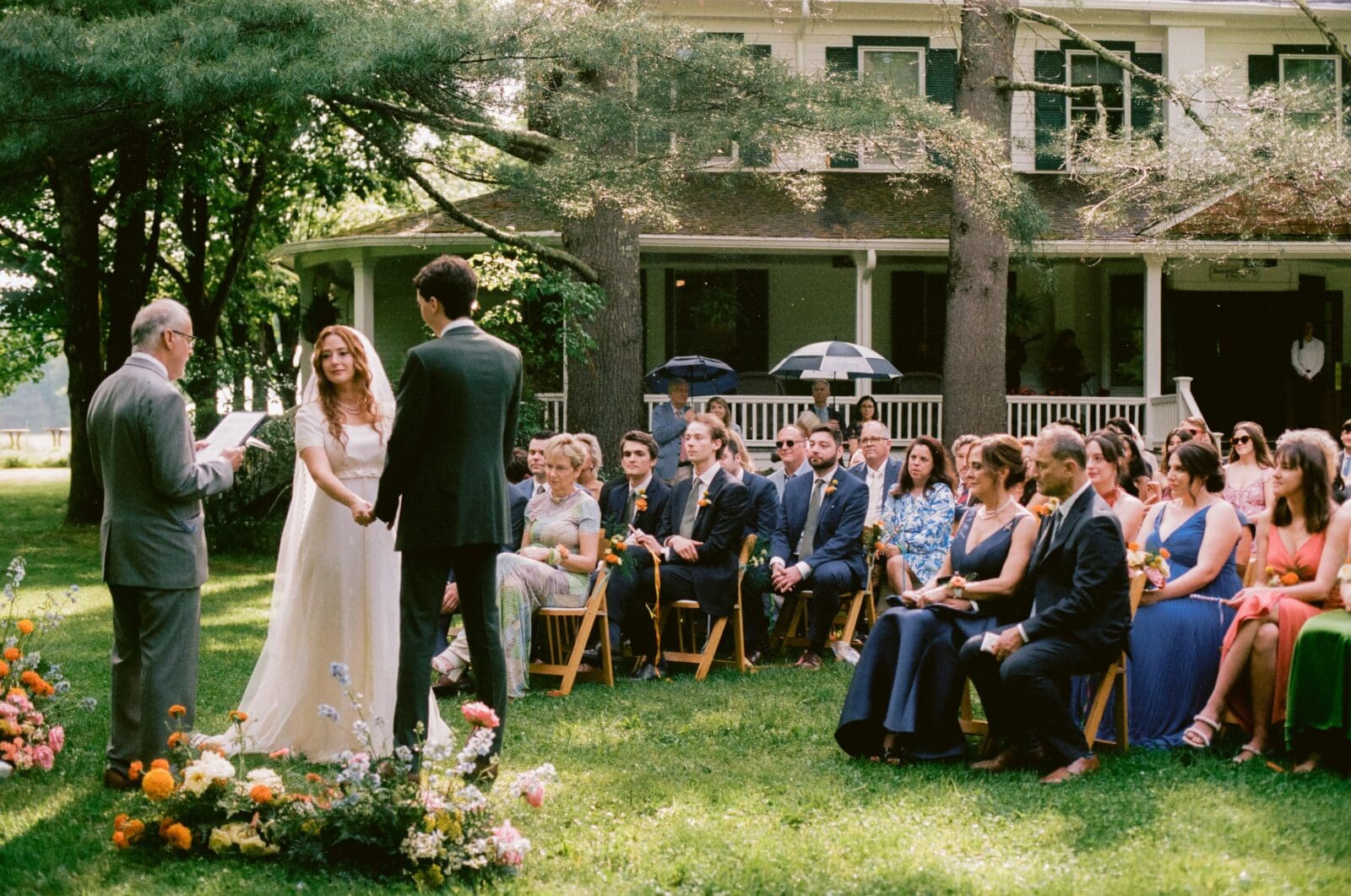 Bride and groom standing at the altar during their Beaverkill Valley Inn wedding ceremony