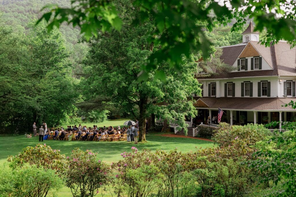 Wedding ceremony at Beaverkill Valley Inn taken from afar