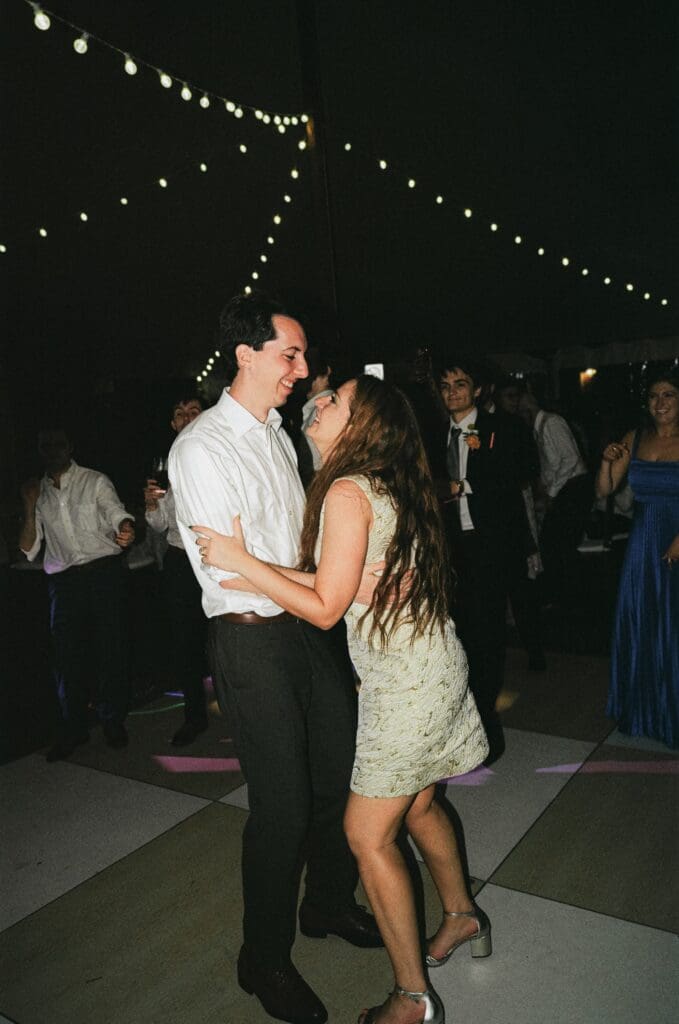 Bride and groom dancing together 