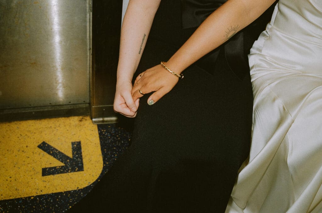 Close up of the bride's hands on the subway