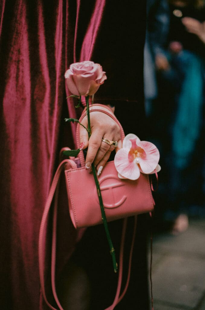 Close up of a wedding guest outfit