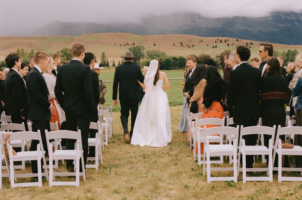 Bride walking down the aisle with her father