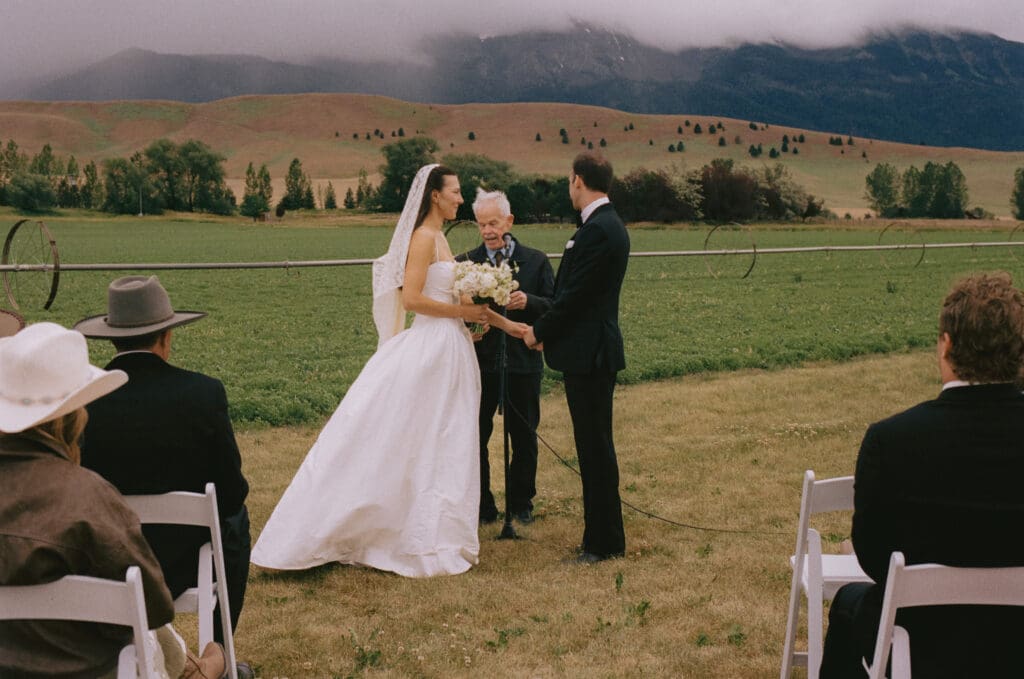 Bride and groom standing at the altar