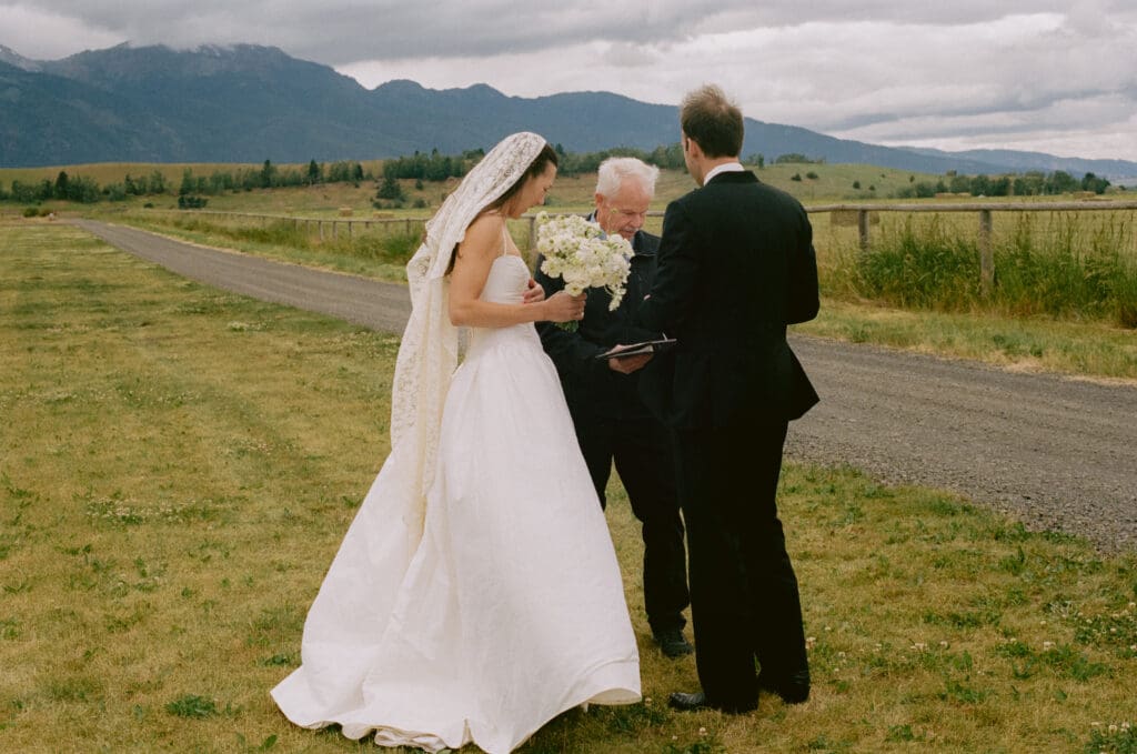 Bride and groom signing the marriage license