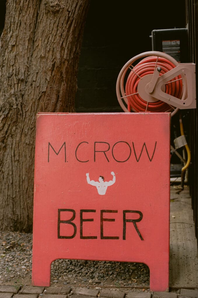 M. Crow Beer Sign at a western mountain wedding