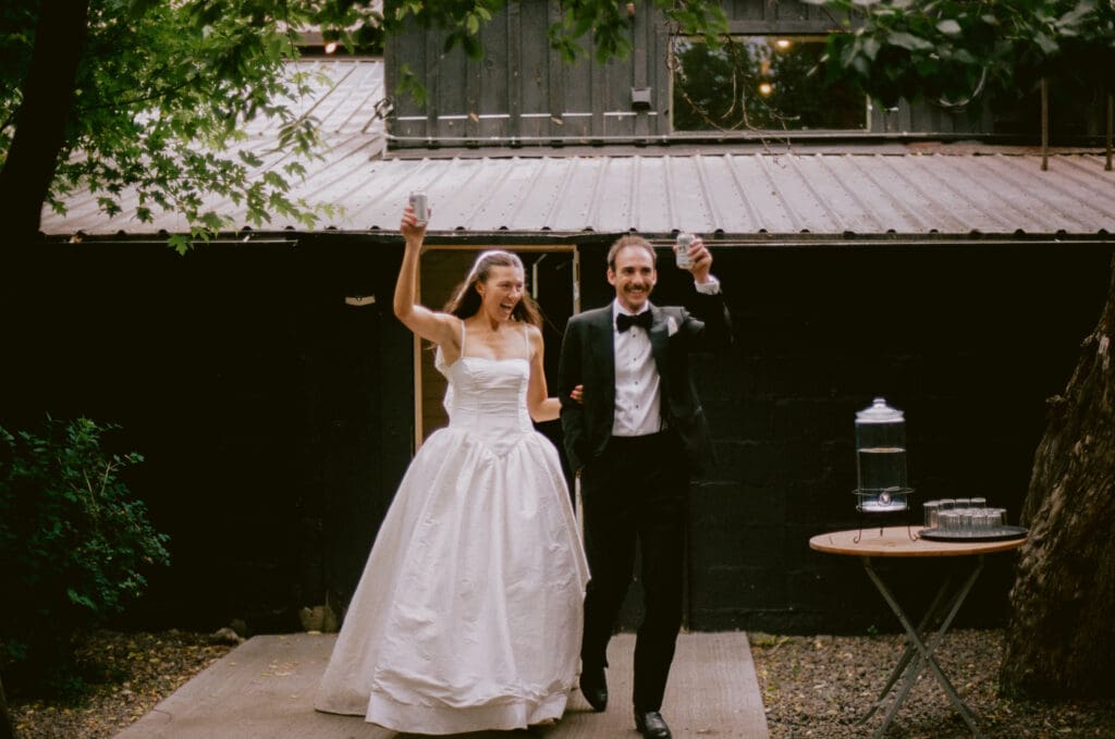 Bride and groom making their entrance to the reception
