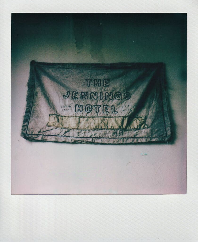 Polaroid of The Jennings Hotel sign