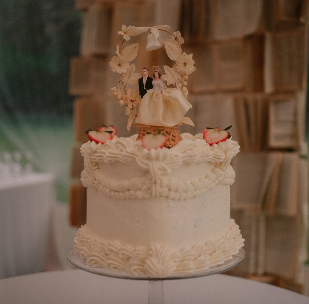 Wedding cake with a vintage cake topper